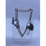 Silver Bracelet with Bugle Charm & Heart Padlock, 17.6g, 18cms.