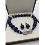 A Lapis Lazuli necklace and earrings set (beads 20mm !). Clasp with cubic zirconia and marked "925".