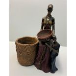 Unusual African sculpture of 2 women and their cooking pots, made from clay with metallic finish.