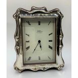 Rectangular silver framed clock made by R.Carr clockmakers, 19x15cms