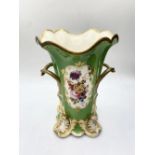 Daniel four footed vase with floral design 18cms tall in good condition.