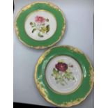 A pair of H&R Daniel plates with rococo scrolling and floral centres. (some marks from use)