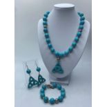 A Turquoise/howlite Necklace, Bracelet and Earrings set(4)