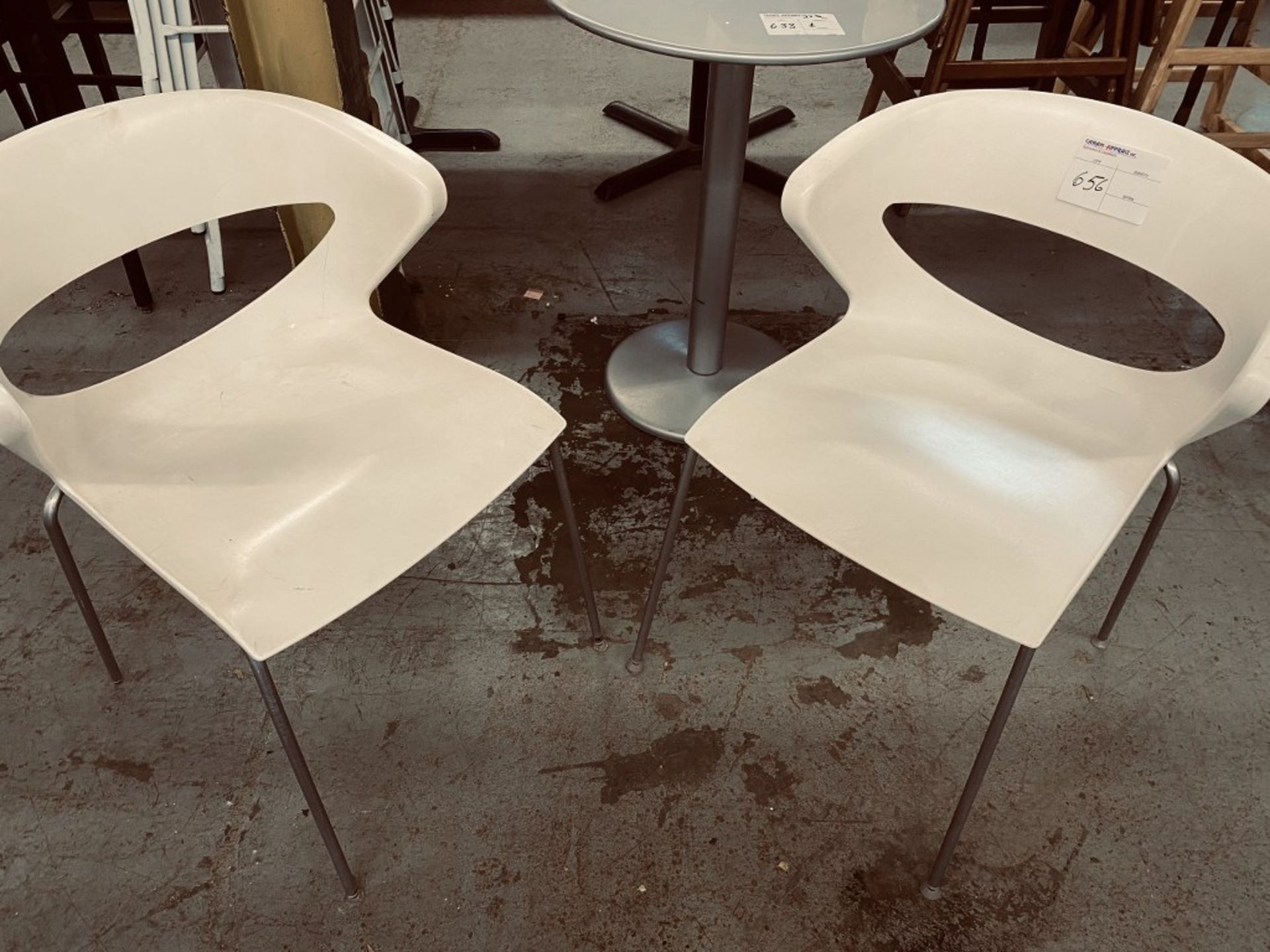 STACKABLE WHITE PLASTIC CHAIRS X2