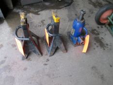 Lot includes (1) hydraulic bottle jack, 12 ton cap., and (2) assorted jack stands