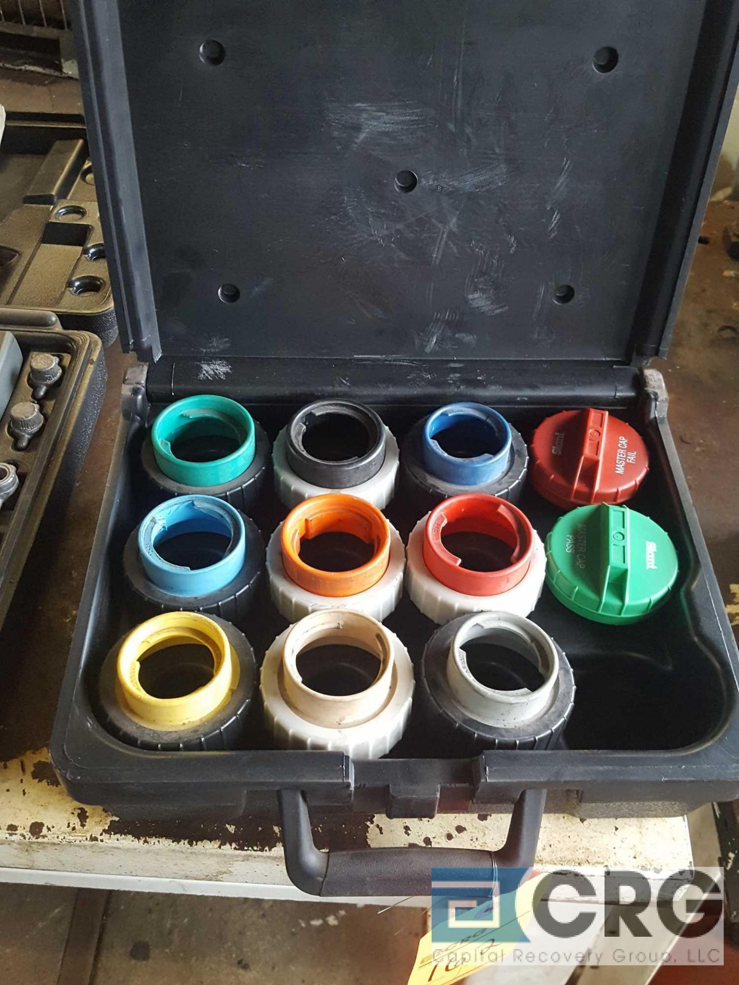 Set of STANT FUEL CAP TESTING ADAPTERS.