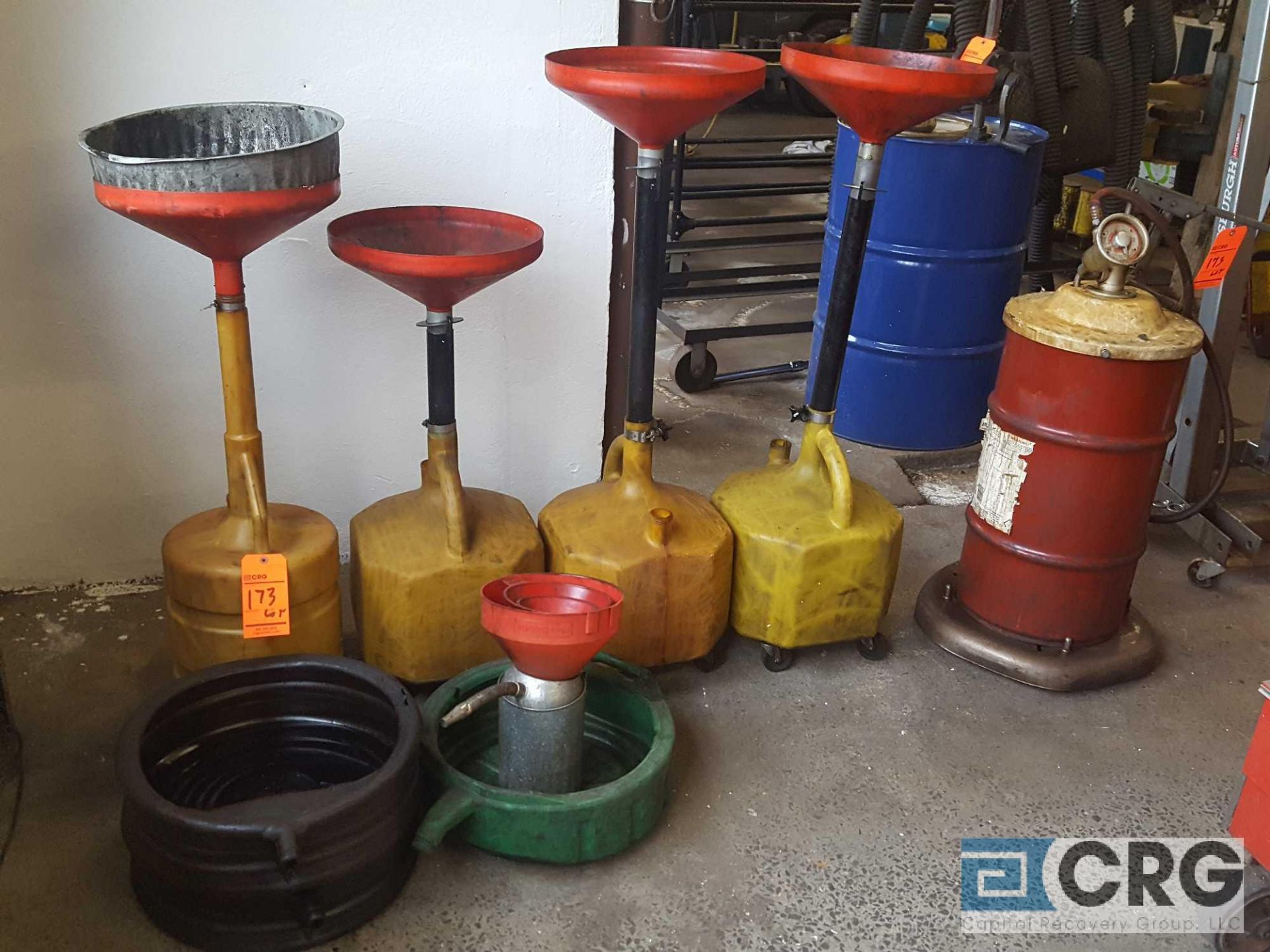 Lot of assorted motor oil recovery tanks and pans, and (1) portable Lube unit