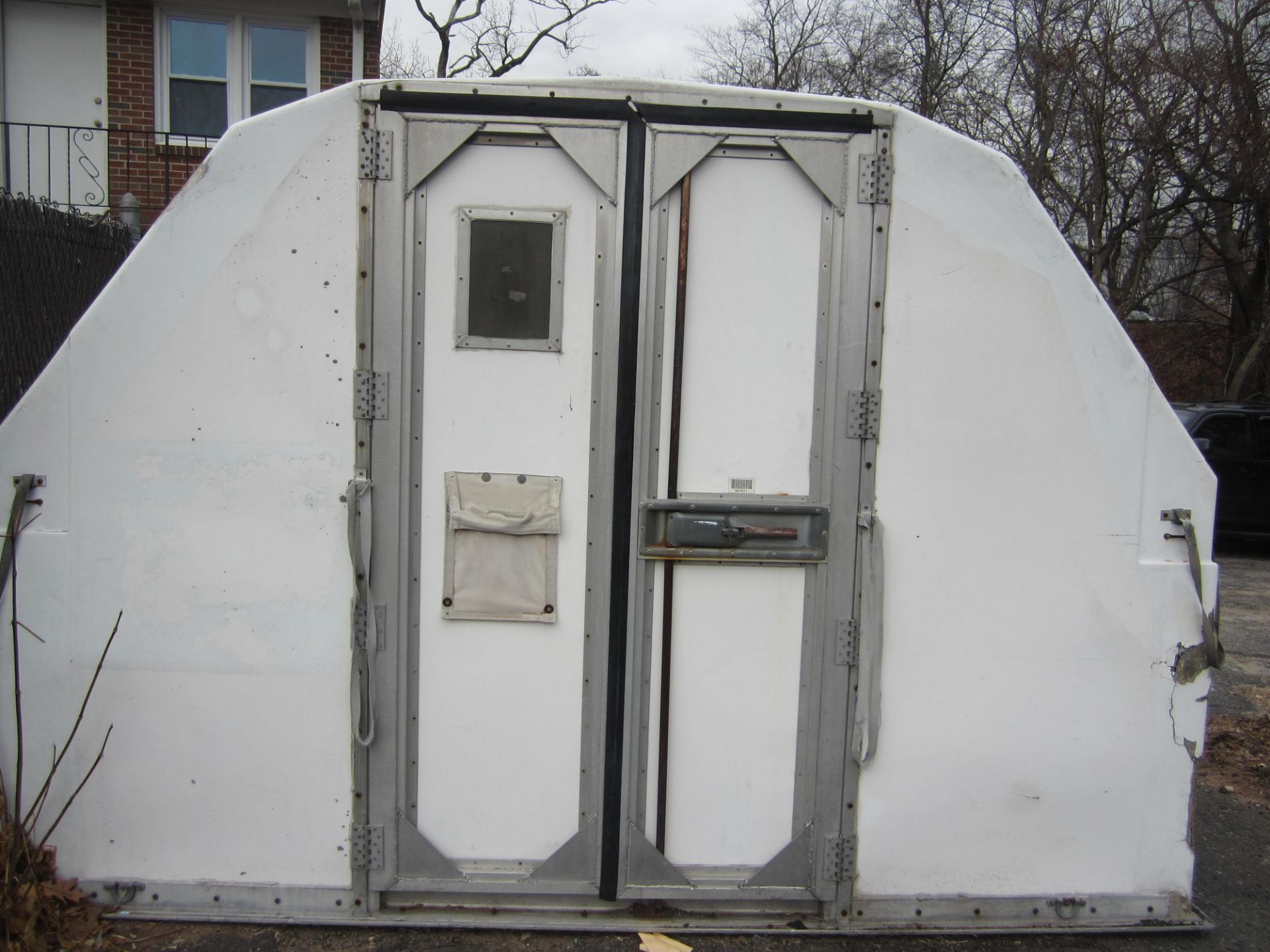 Portable storage shed with 2 swing doors