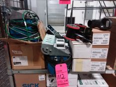 Lot of (4) bar code scanners, (4) encoders, and (4) battery charger cradles