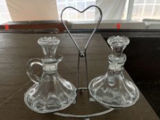 Cruet Sets (oil and vinegar), lot includes (14) racks and (64) vases