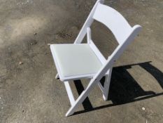 Lot of (20) white resin folding chairs