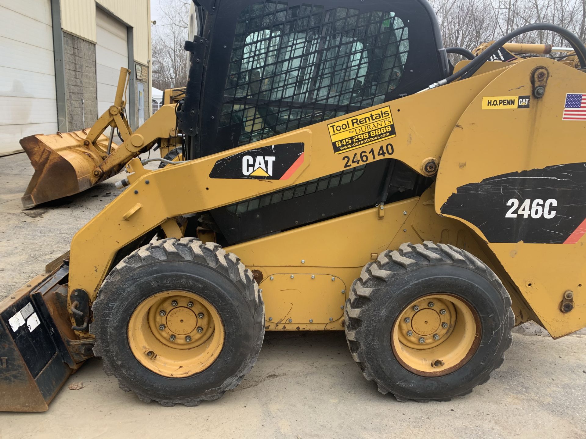 Cat 246C skid steer loader, 1,975 hours, new tires, built in 2013, s/n OJAY07990