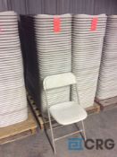 Lot of (50) beige metal / plastic folding stack chairs