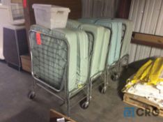 Lot of (4) portable beds with mattress covers