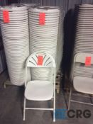 Lot of (50) white metal / plastic folding stack chairs