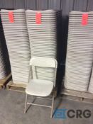 Lot of (50) beige metal / plastic folding stack chairs