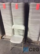 Lot of (50) beige metal / plastic folding stack chairs
