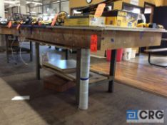 Lot of (10) custom made work tables/benches, with steel metal legs (contents of table not included)