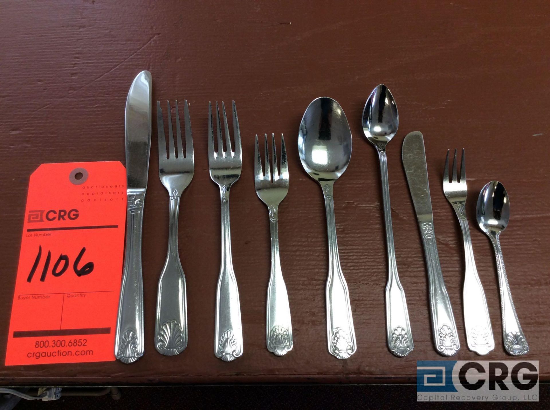 Lot of shell pattern stainless steel flatware; lot consists of (876) dinner forks; (1056) dinner