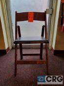 Lot of (100) mahogany wood, padded seat, folding chairs, with storage bags