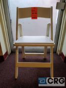 Lot of (100) white wood, padded seat, folding chairs, with storage bags