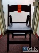 Lot of (100) black resin, padded seat, folding chairs, with storage bags