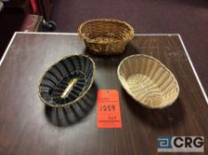 Lot of assorted bread baskets including (78) black and gold wicker bread baskets, and (87) natural