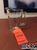 Lot of (106) 60 oz glass pitchers, with (12) racks, add'l $5 fee per rack