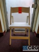 Lot of (100) white wood, padded seat, folding chairs, with storage bags