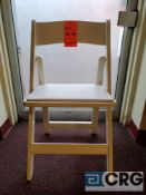 Lot of (100) white wood, padded seat, folding chairs, with storage bags