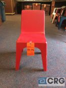 Lot of (100) red plastic kid chairs