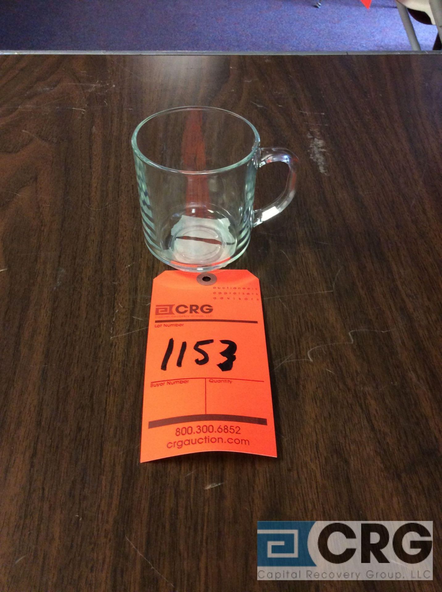 Lot of (276) 10 oz. clear coffee mugs, with (14) racks, add'l $5 fee per rack