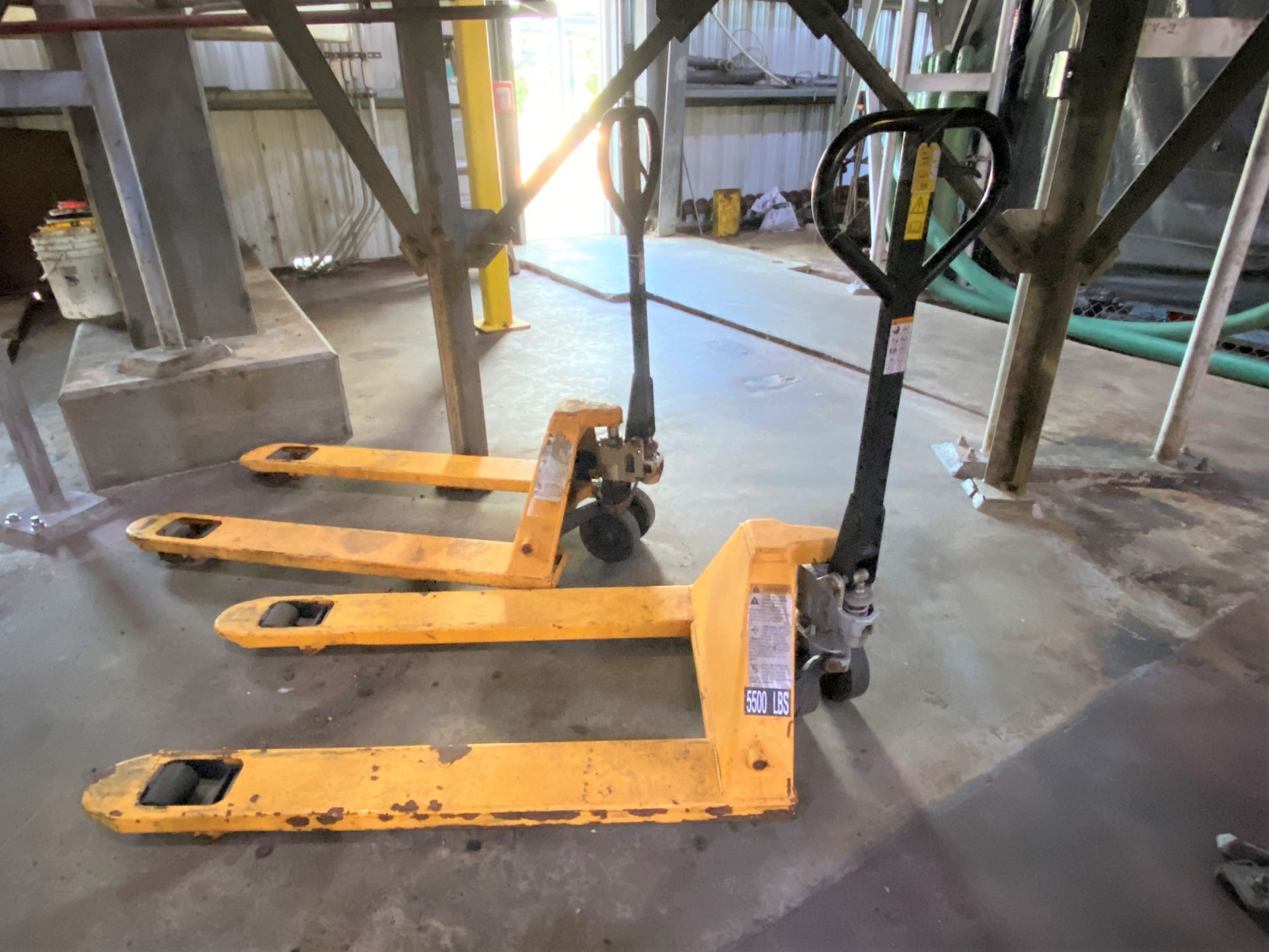 (Lot of 2) 5,500# manual hydraulic pallet jacks