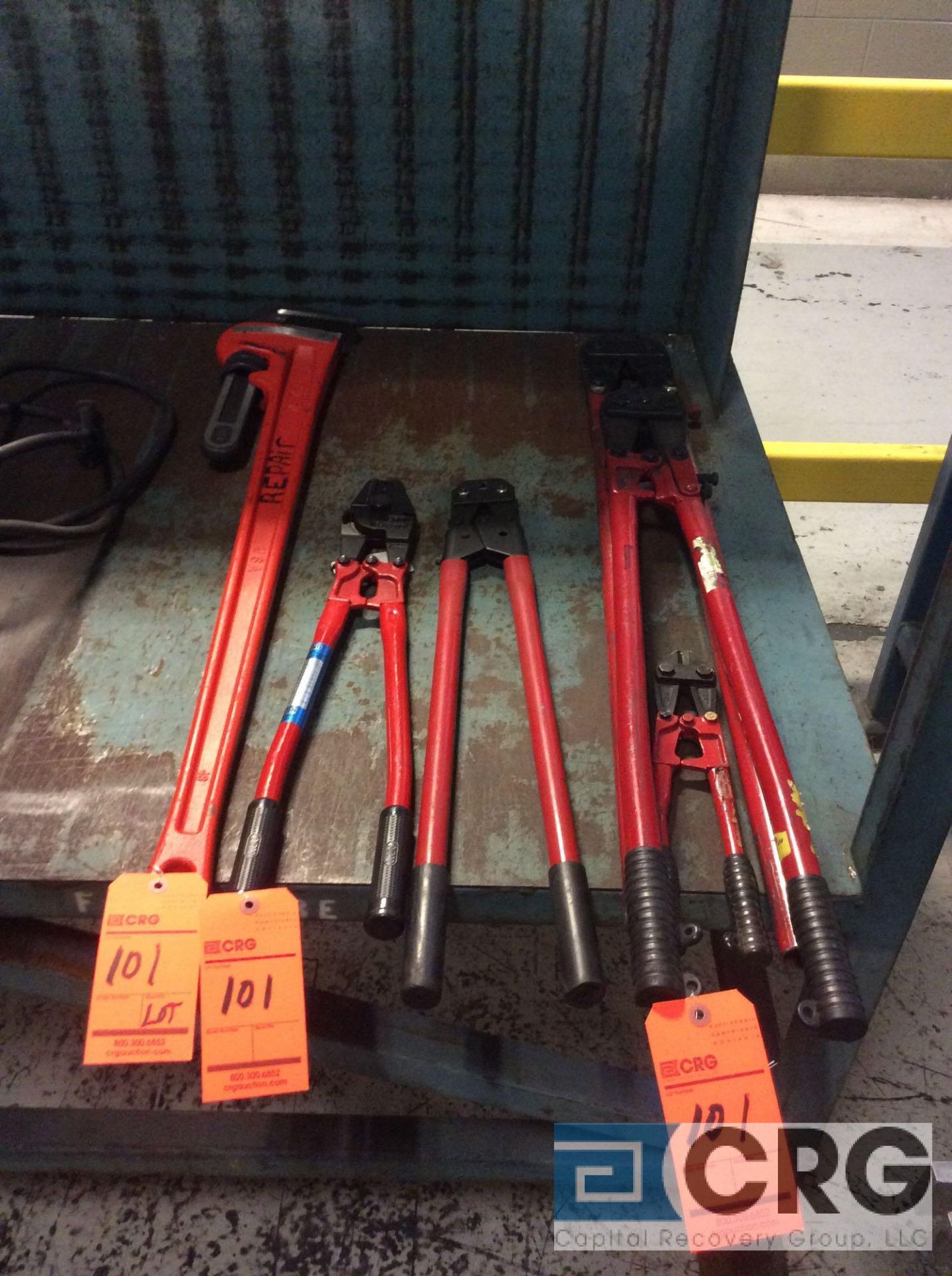 Lot of heavy duty hand tools including Ridgid 48 inch pipe wrench, (2) wire crimper tools, and (2)