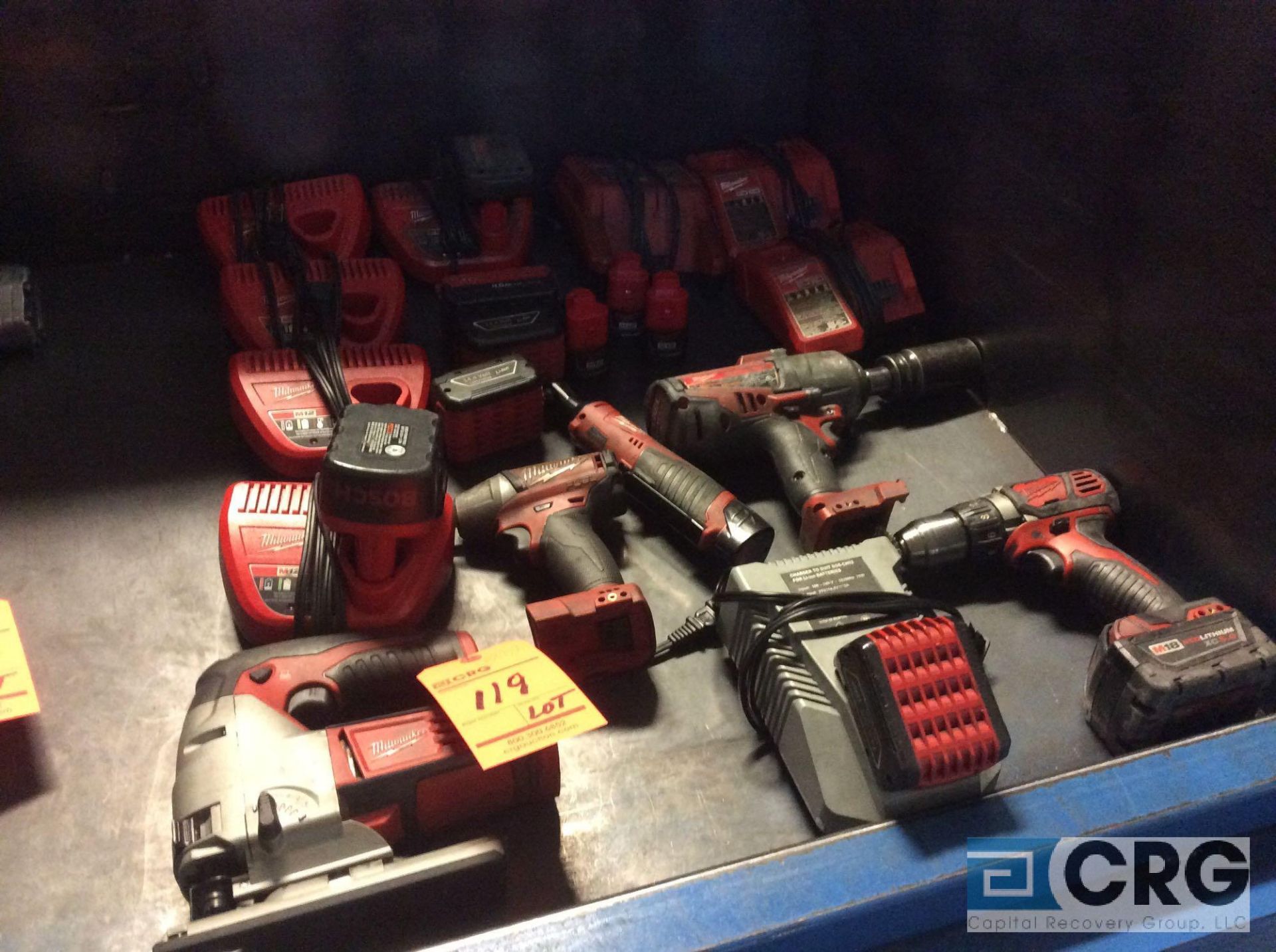 Lot of Milwaukee cordless tools including (1) jigsaw and (4) asst drills with chargers and