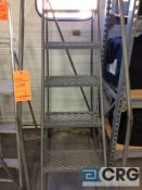 Lot consists of a 7’ portable rolling stock ladder (Linen room)