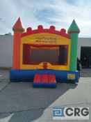 Moon walk style castle, red/yellow/blue bounce house with blower