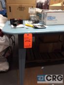 Lot consists of a blue wood table 41 in. tall X 6’ X 7’ (Linen room)