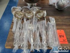 Lot consists of assorted silverplated ladles, tongs, serving utensils to include, (6) ladles, (3)