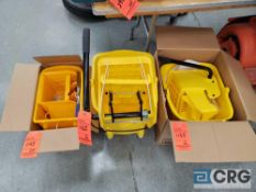 Lot consists of (3) assorted yellow mop buckets with strainers