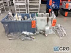 Lot consists of assorted silverplated and stainless flatware/serving utensils to include tongs,