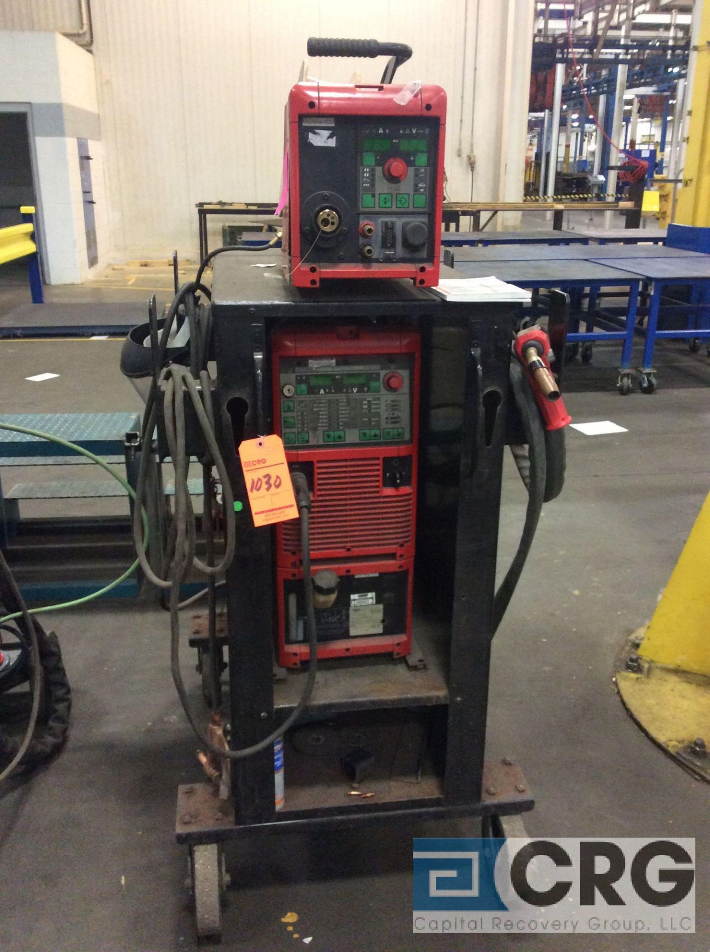 Fronius portable welder including TRANSPULS SYNERGIC 4000 power source and welder wire feed