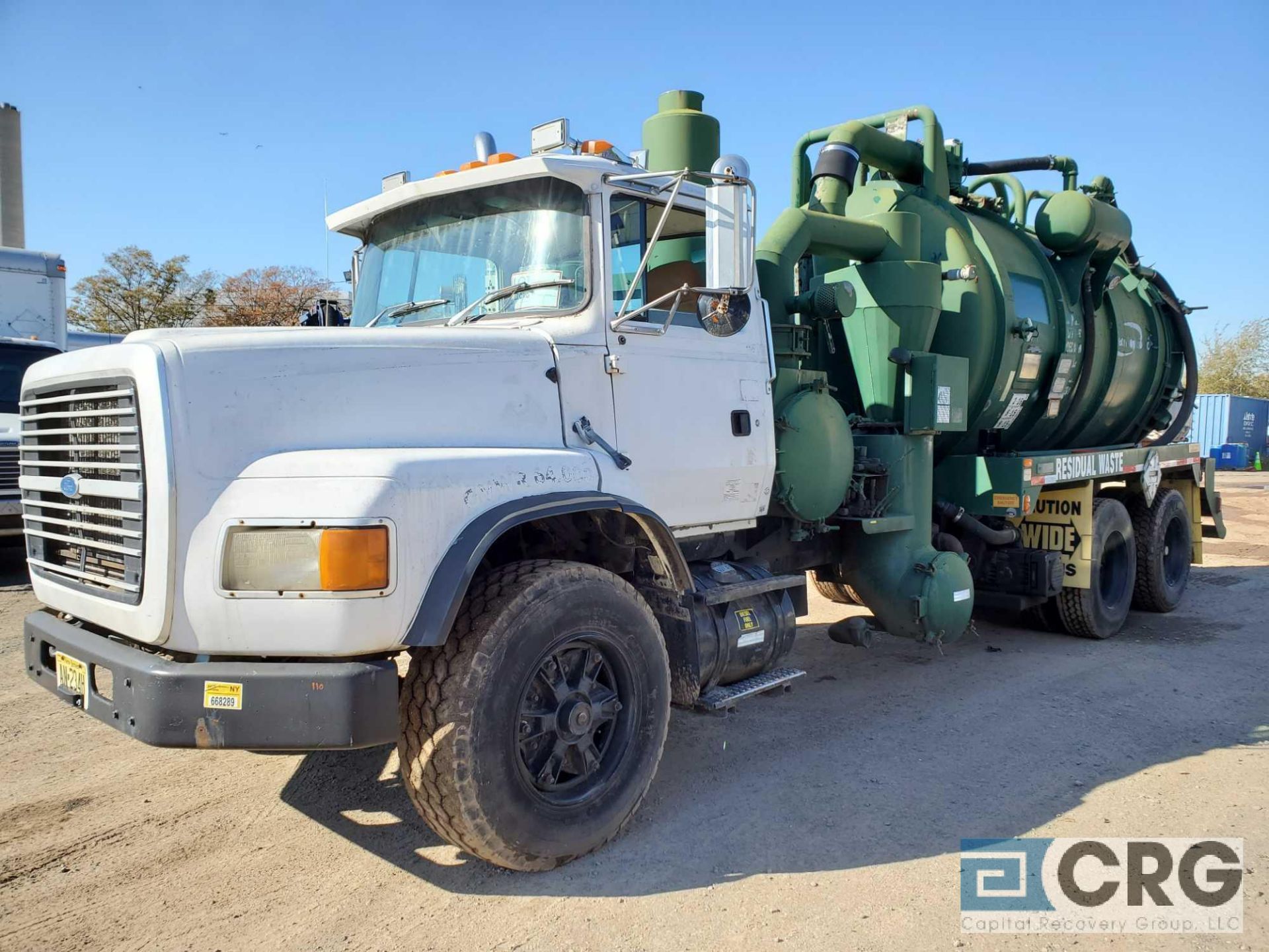 1997 Ford L9000 tandem axle Liquid Vac Truck, 64,000 GVWR, with 3,200 gal. capacity Presvac carbon