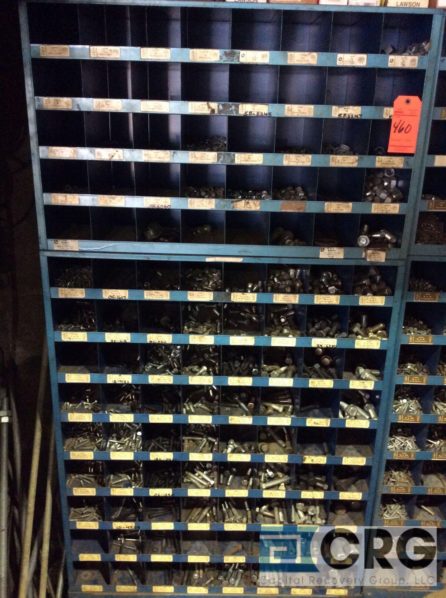 Lot of (4) sections of pigeon hole shelving with NUTS AND BOLTS contents