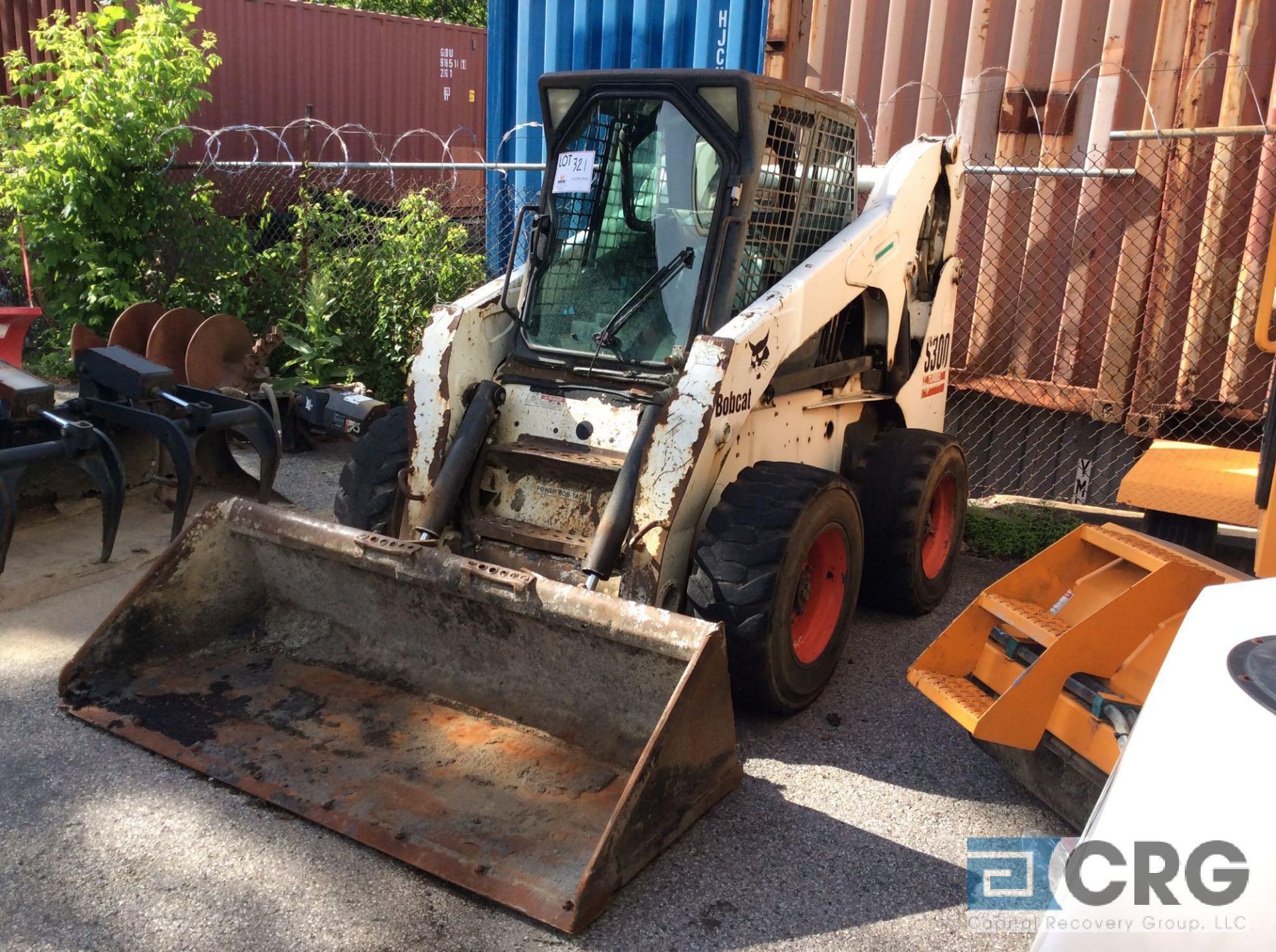 2005 Bobcat S300 skid steer loader, sn 525816799, 2,561 Hours, enclosed cab, with attached 72 inch