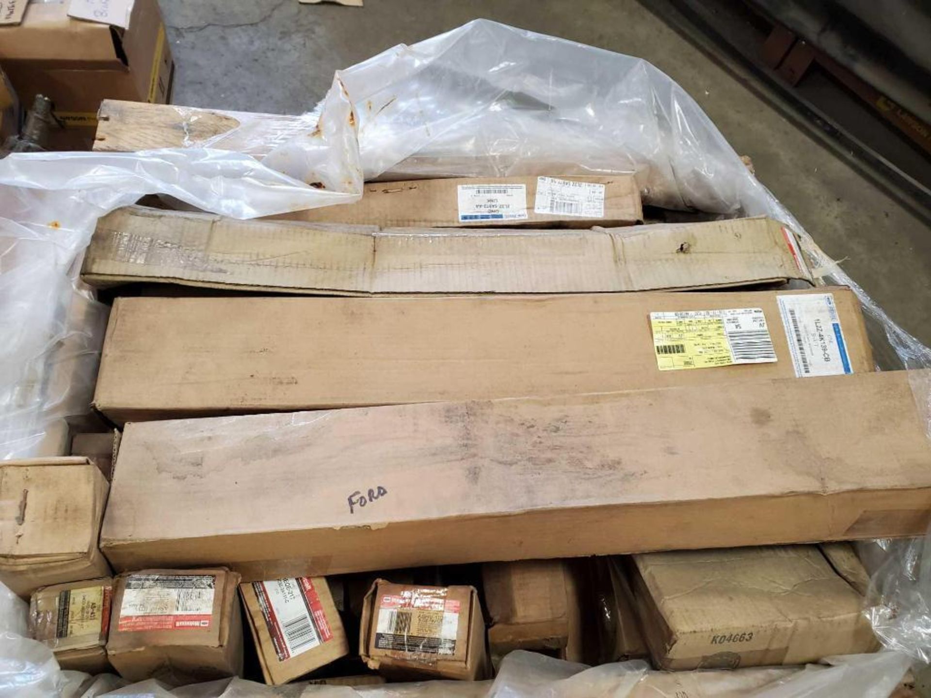 Lot of assorted Ford parts, including (5) boxes of rotor disque rotors, (3) new exhaust pipes, - Image 8 of 9