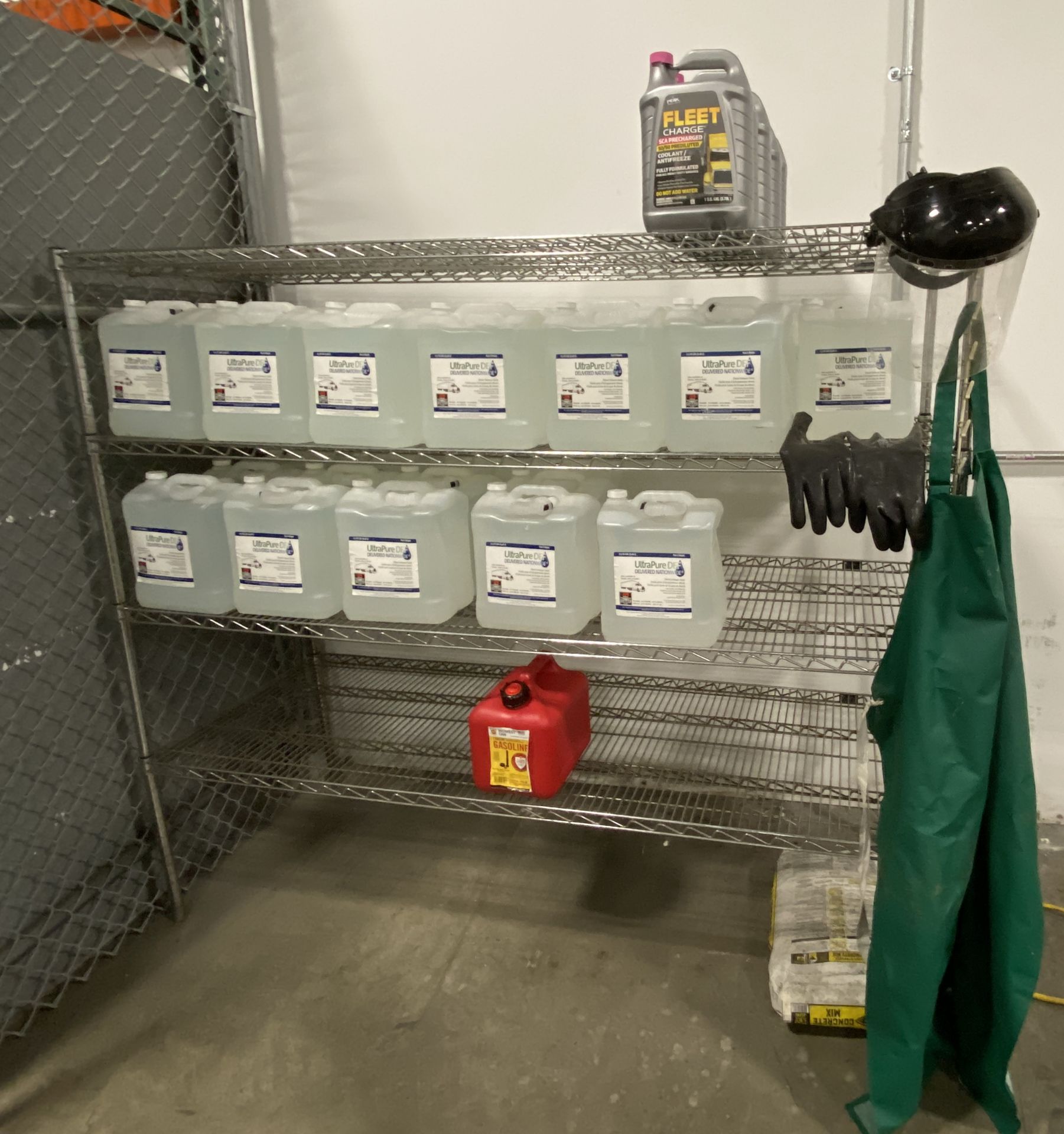 6' X 24" X 4 tier Metro rack with contens including (6) gallons of commercial truck antifreeze, (33)