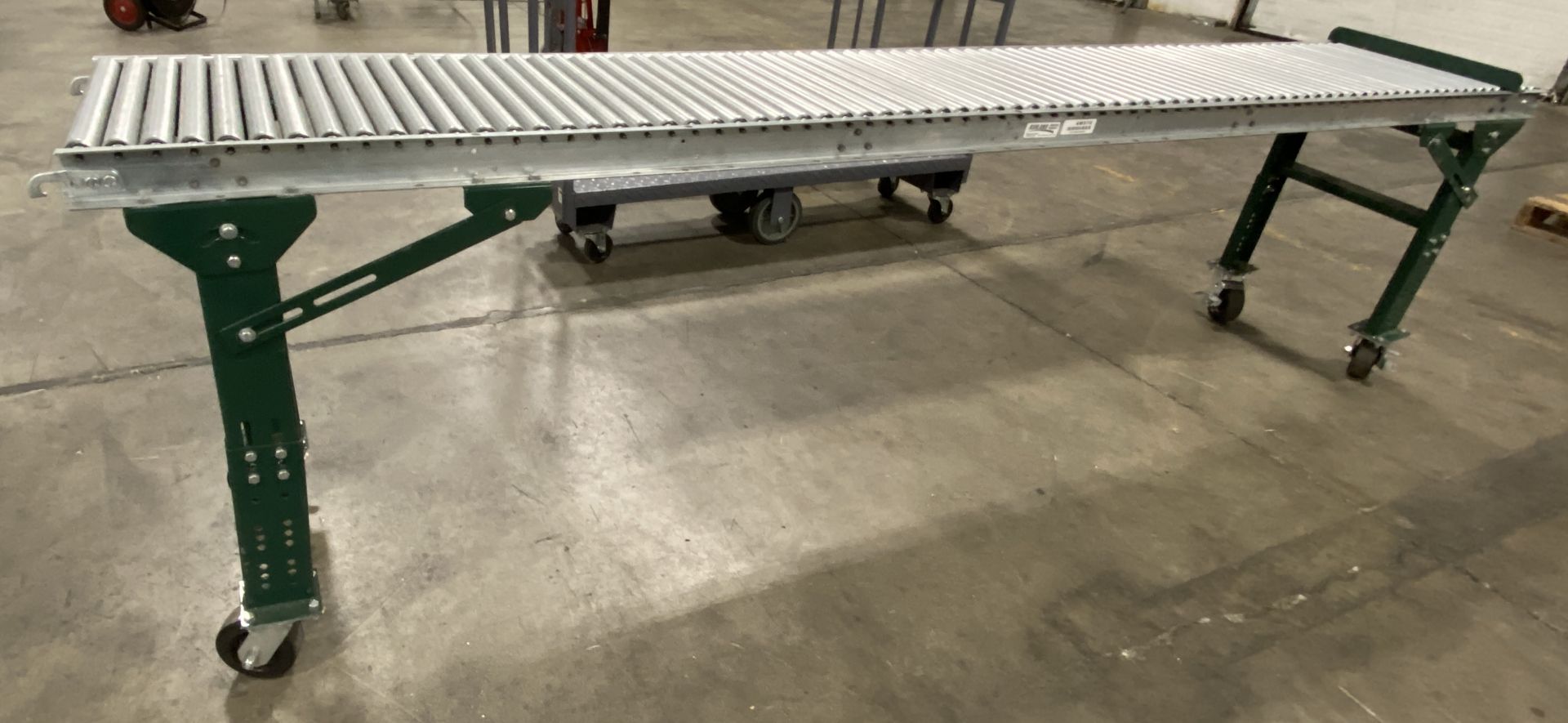 Ashland 18" (w) X 12' (l) galvanized steel roller conveyor on rolling adjustable height steel stand