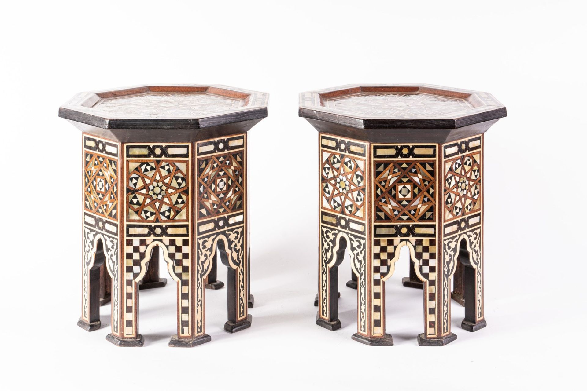 Arte Islamica A pair of wooden coffee tables inlaid.
