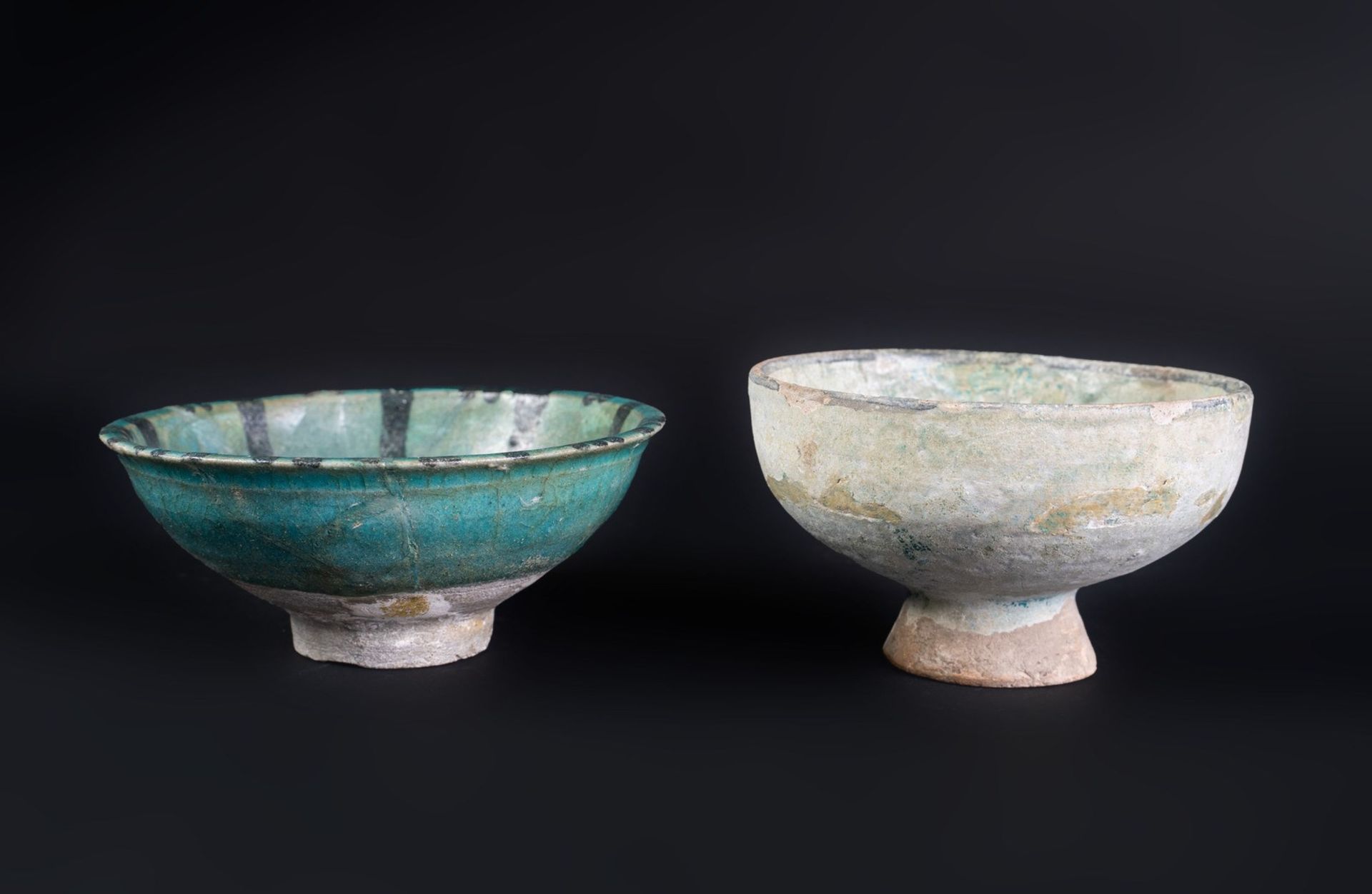 Arte Islamica Two turquoise glazed pottery bowlsIran, Kashan, 12th -13th century .